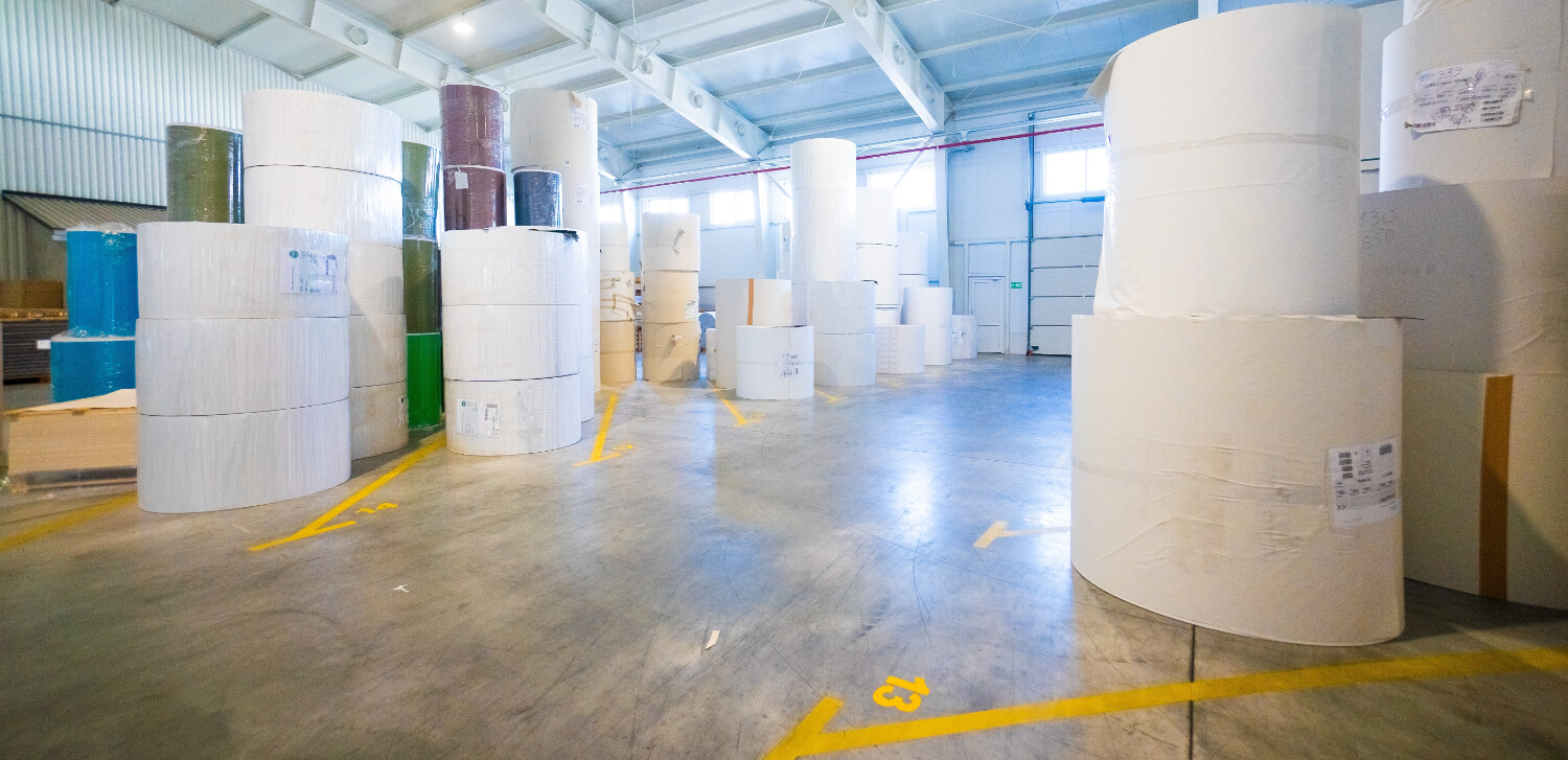 Big,Warehouse,With,Paper,Rolls,And,Printing,Material